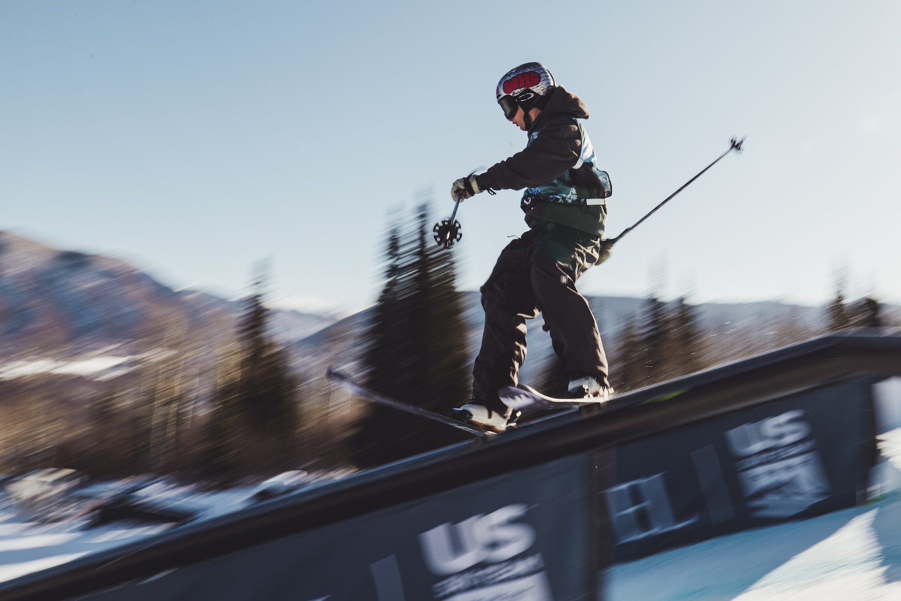 Cody hitting a rail in Aspen, spring 2025