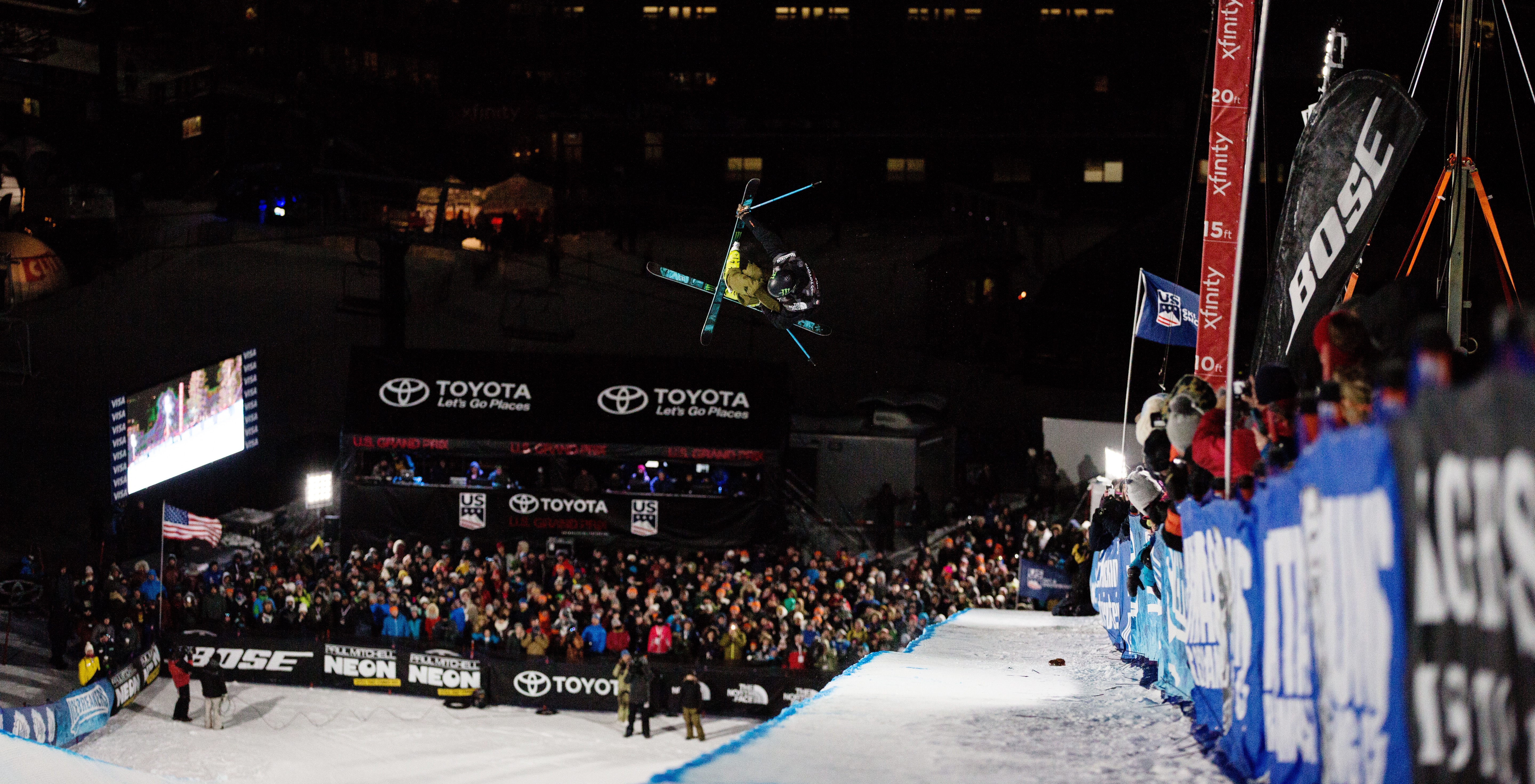 David Wise airborne at Mammoth Mountain Ski Area at night.