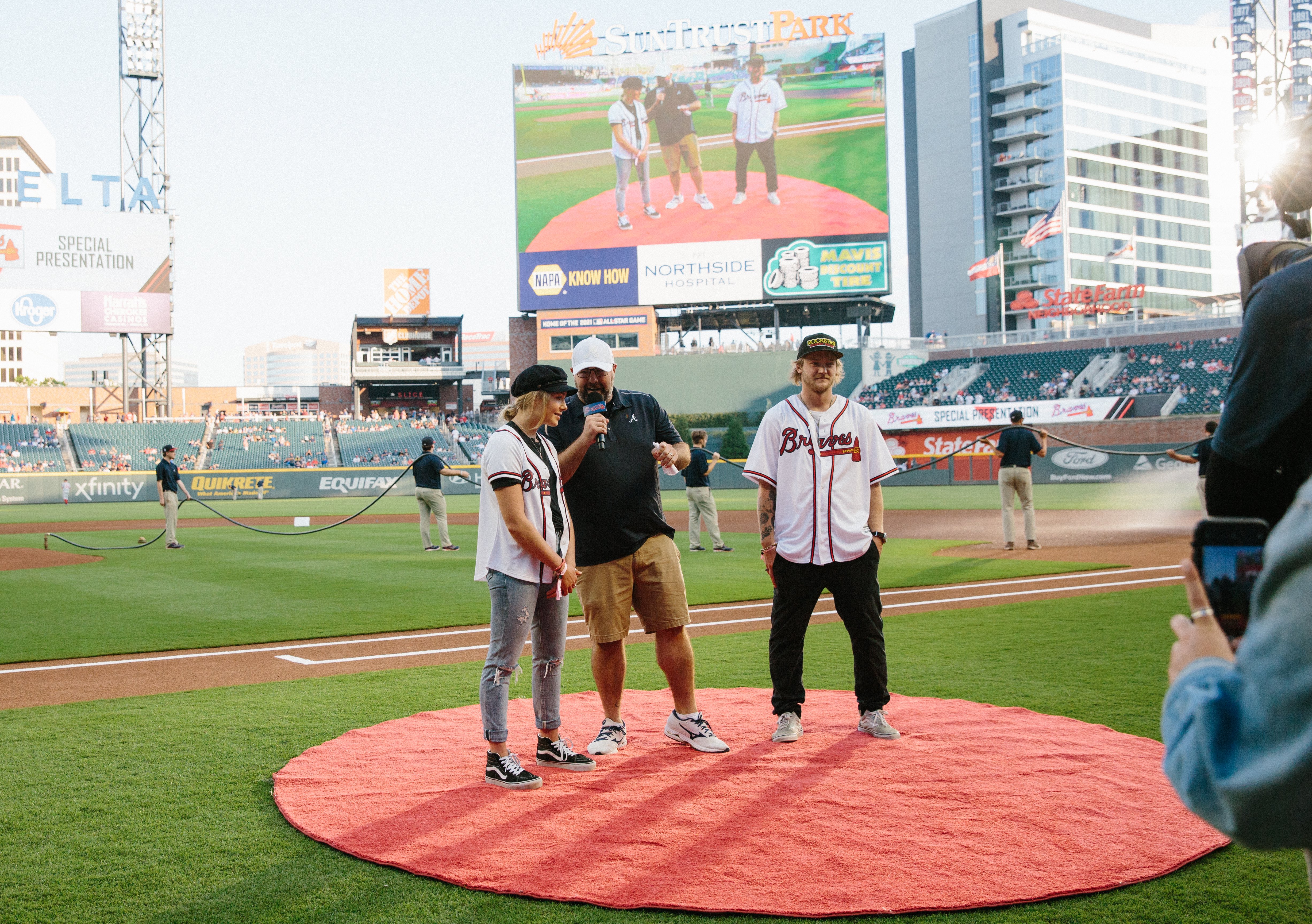 Kyle and Maggie on field at SunTrust Park