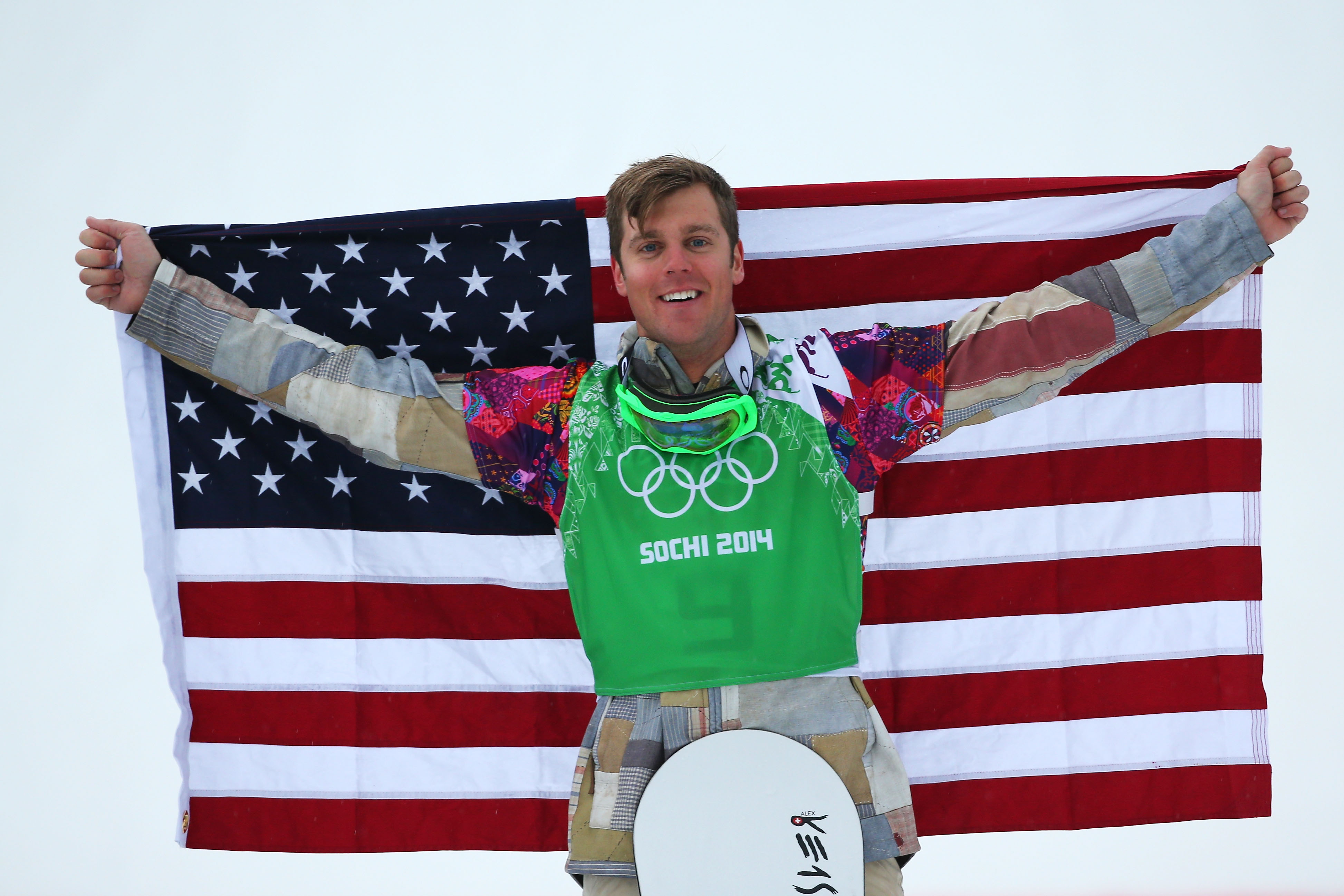 Alex Deibold poses with the American flag