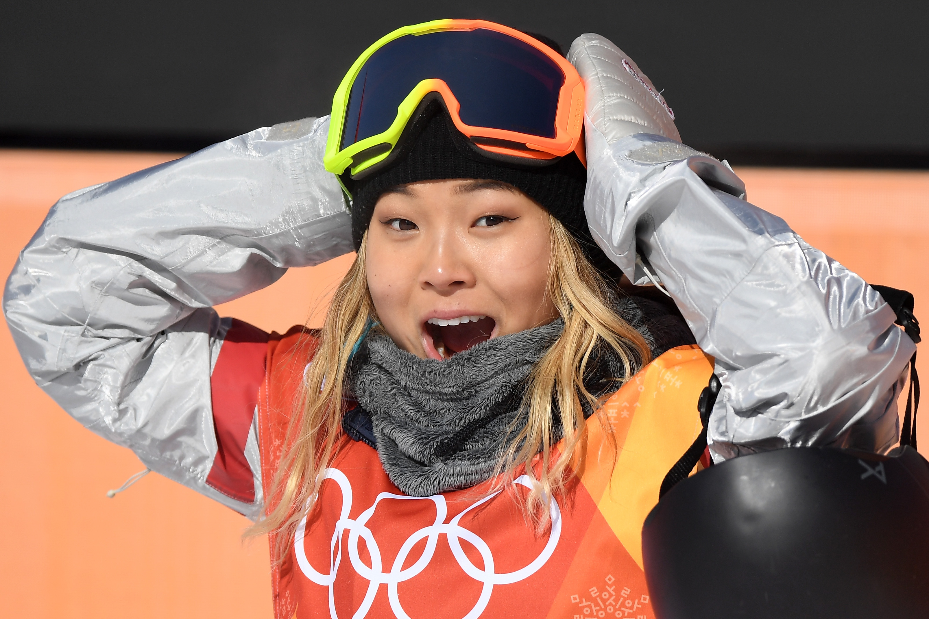 Chloe Kim reacts to her first-run score of 93.75 in the halfpipe snowboard at the 2018 Olympic Winter Games Tuesday at Phoenix Snow in Pyeongchang-gun, South Korea. (Getty Images - David Ramos)