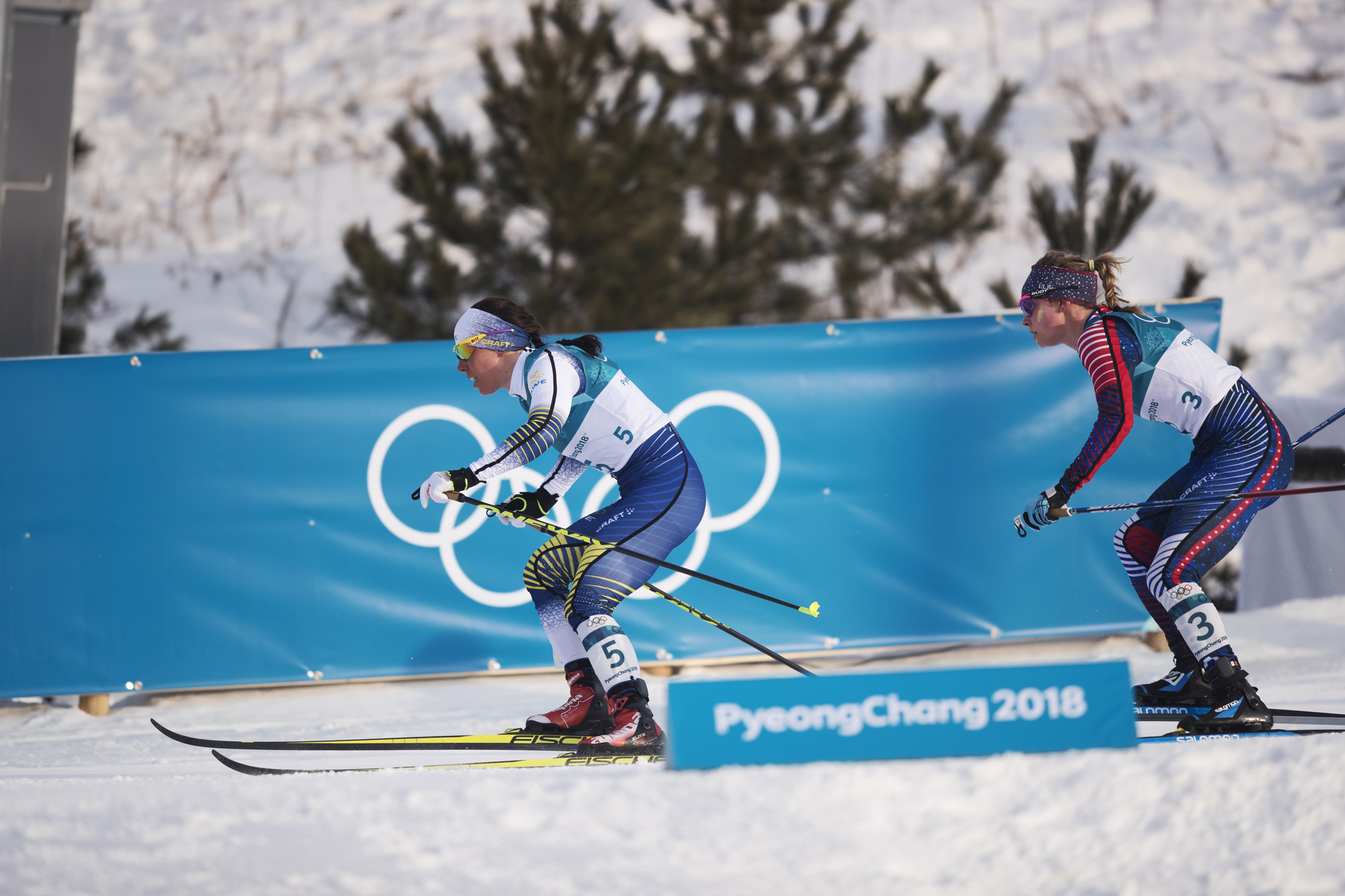 Charlotte Kalla of Sweden and Jessica Diggins lead the start of the skiathlon Saturday in Pyeongchang-gun, South Korea. (Getty Images - Nils Petter Nilsson)