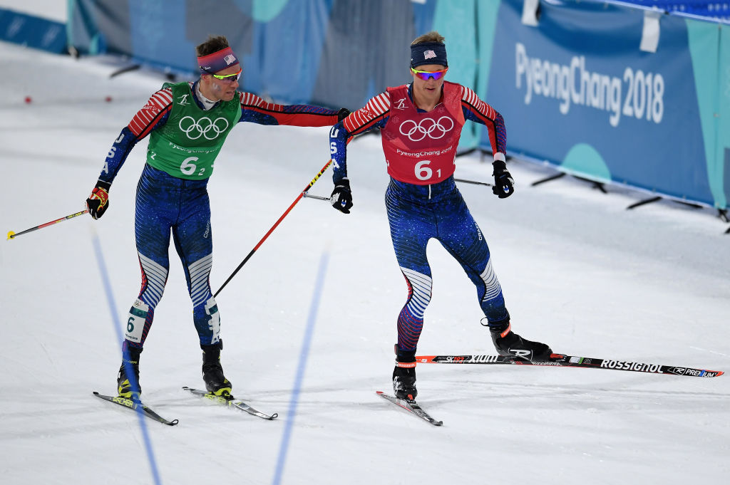 Erik Bjornsen tags off to Simi Hamilton during the team sprint at Alpensia Cross-Country Centre. (Getty Images - Matthias Hangst)
