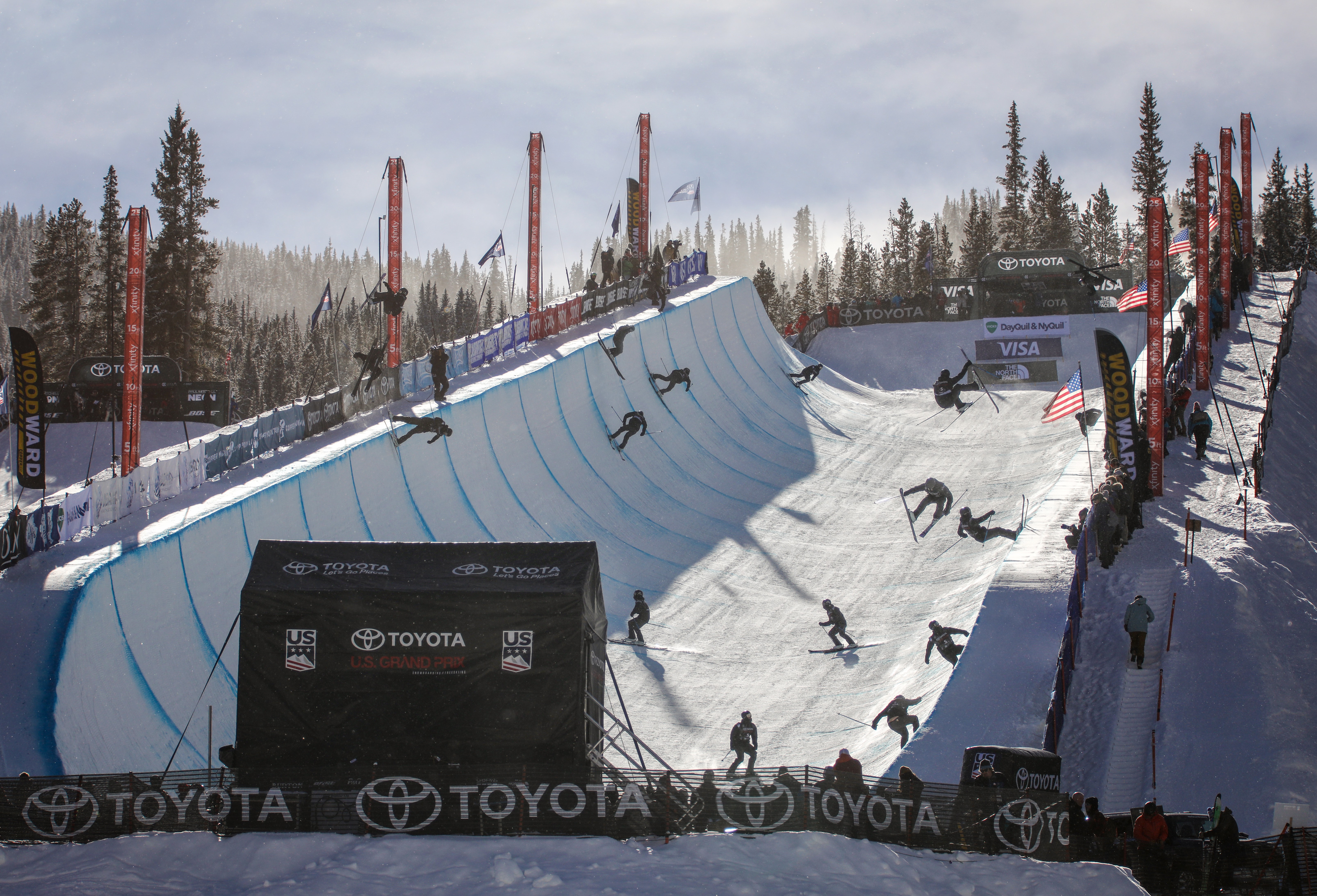 Sequence photo of a freeskier completing a full superpipe run at the Copper Mountain superpipe.