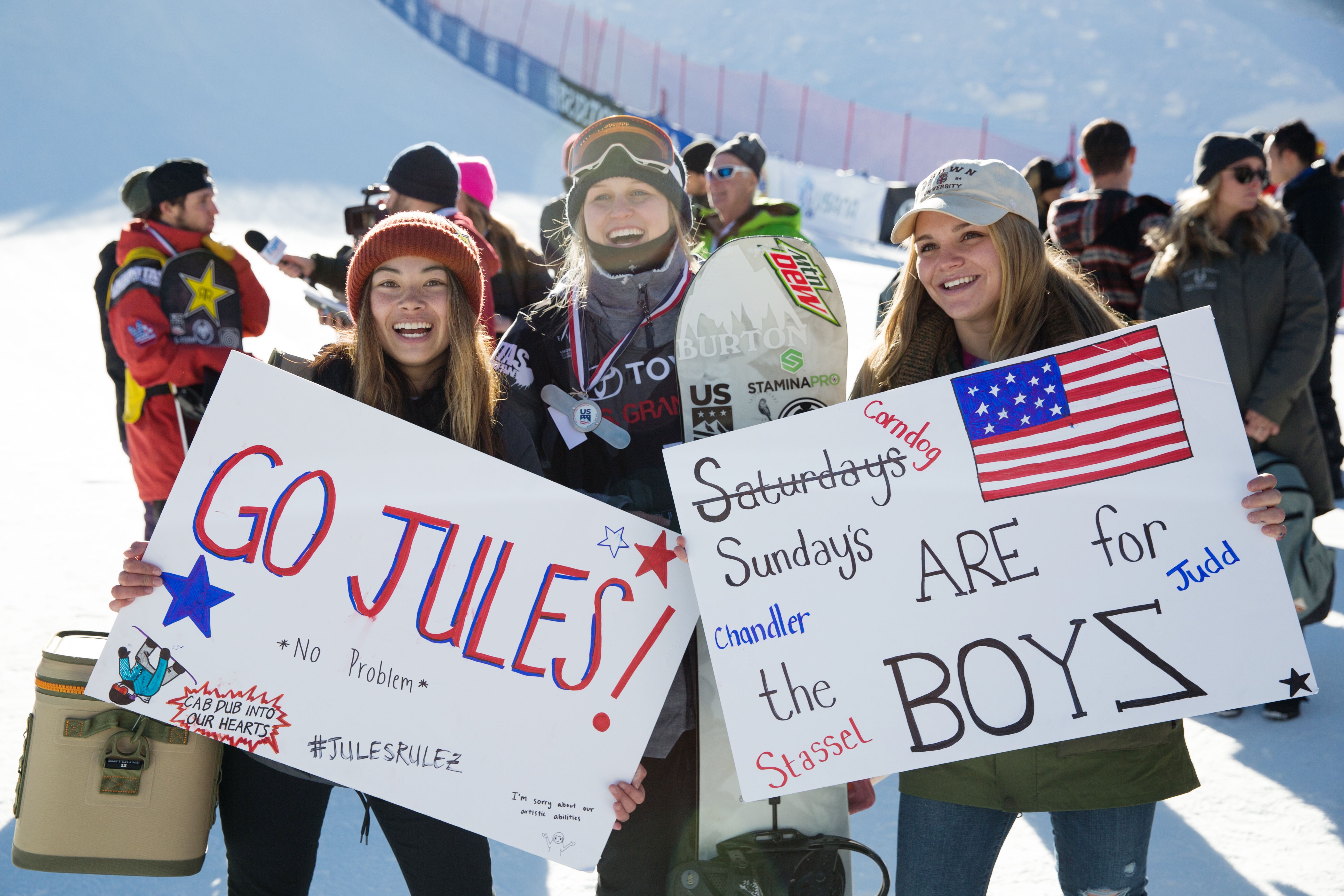 The women's U.S. Snowboard Team supporting their teammates.