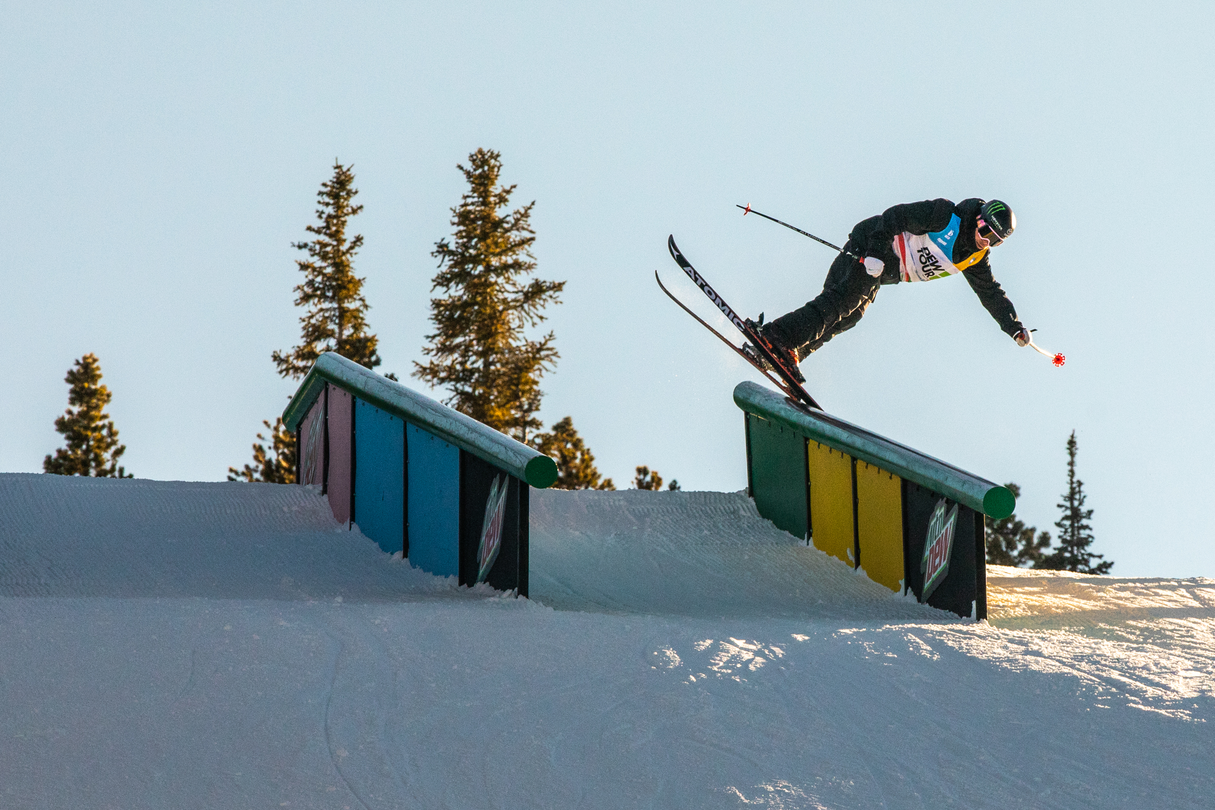 Gus Kenworthy sliding a rail.