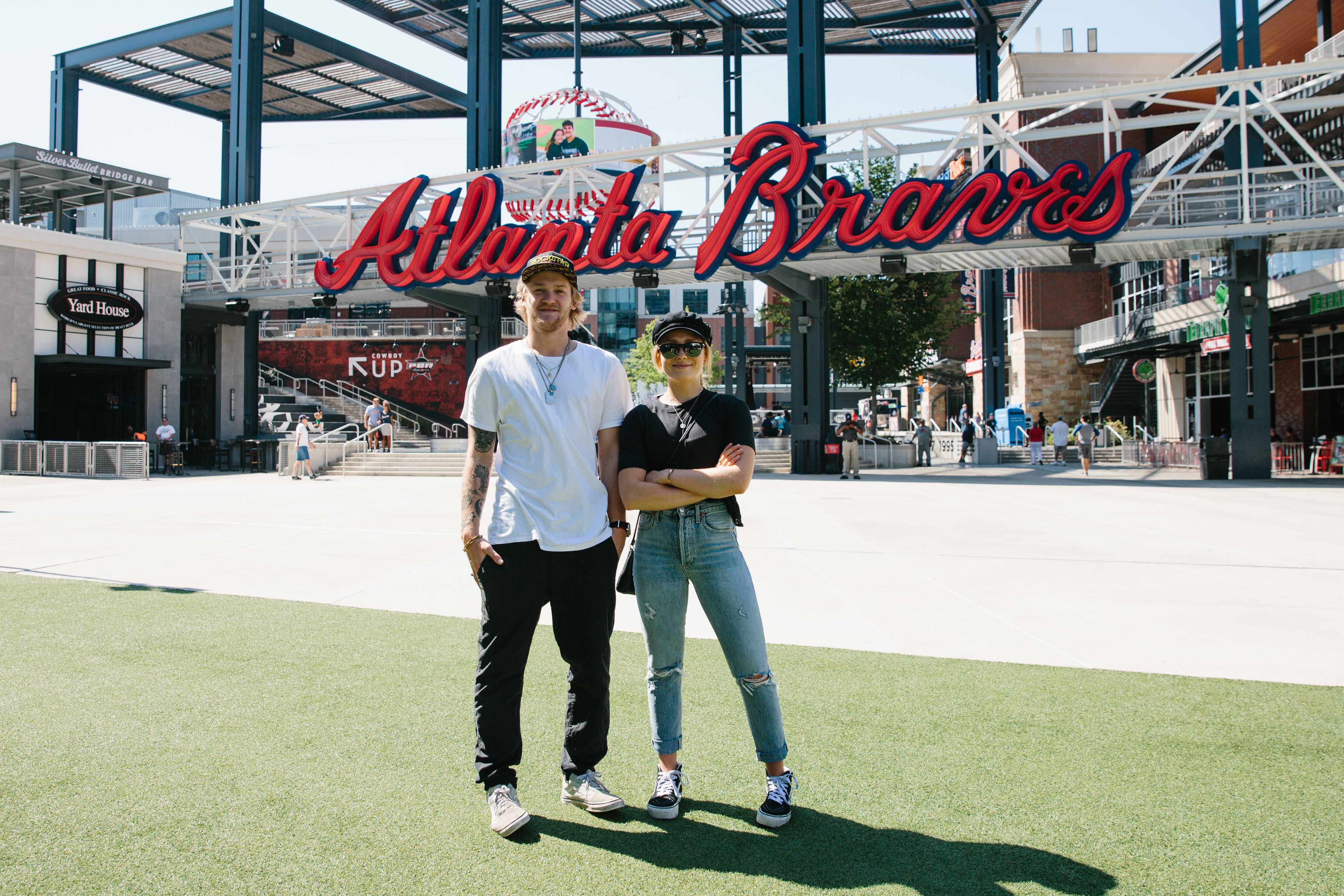 maggie and kyle with braves logo