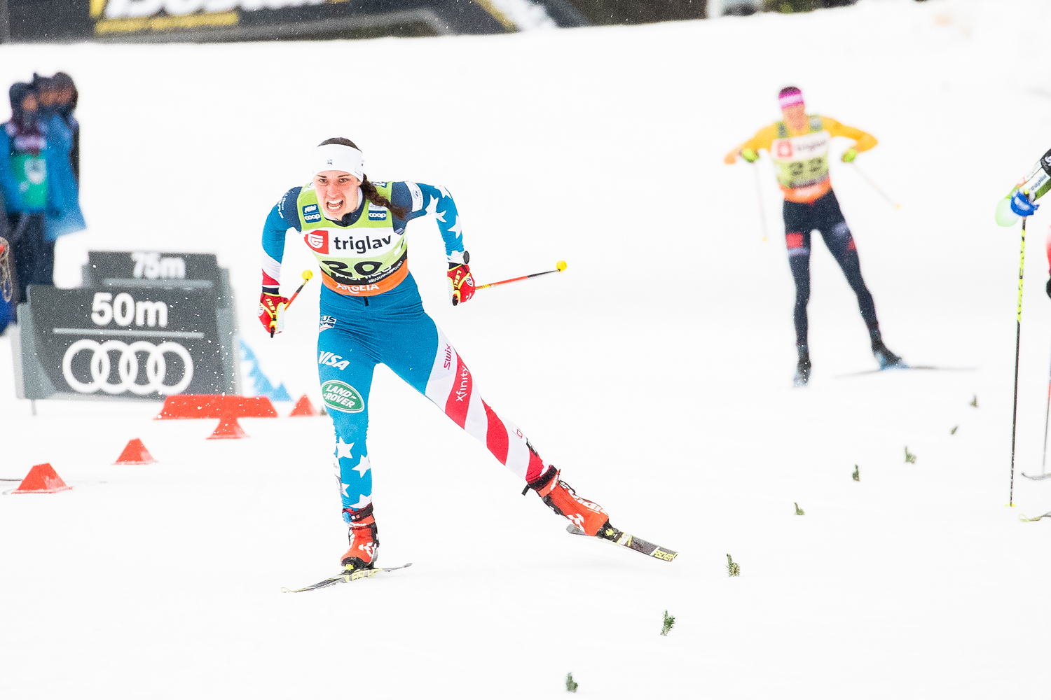 Julia Kern charges to a win her the semifinal heats in Planica, Slovenia, Saturday. (www.nordicfocus.com. © Modica/NordicFocus.)