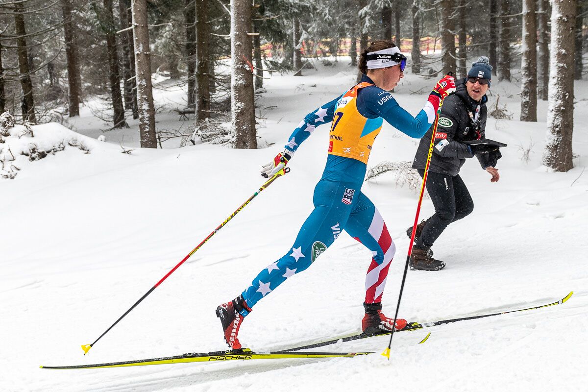 Julia Kern is cheered on by U.S. Ski &amp; Snowboard's Bryan Fish during the 10k classic. (@flyingpoint)