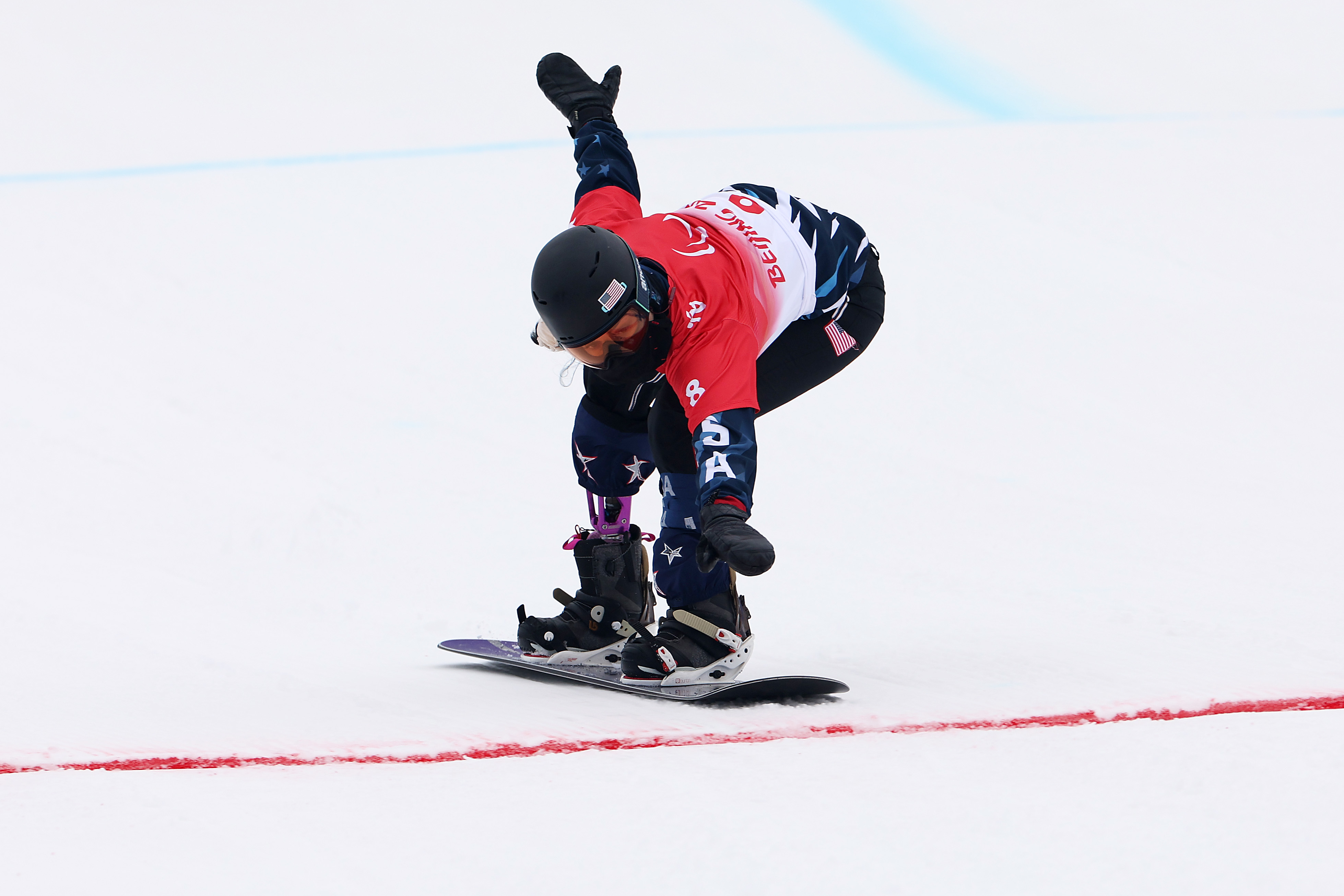 Brenna Huckaby crossing the finish line at the 2022 Paralympic Games