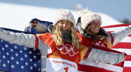 Gold medalist Chloe Kim and bronze medalist Arielle Gold celebrate following the halfpipe final at the 2018 Olympic Winter Games Tuesday. (Getty Images - Clive Rose)