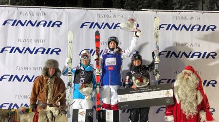Tess Johnson, who took third in Friday's FIS Freestyle World Cup moguls event, shared the podium with France’s Perrine Laffont, who came in first, and Kazakhstan’s Yulia Galysheva, who came in second. (Matt Gnoza - U.S. Ski & Snowboard)