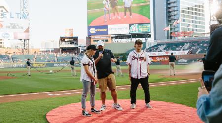 Kyle and Maggie on field at SunTrust Park