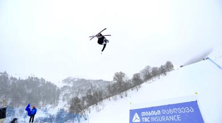 Hunter Henderson throws a trick off the third jump of the slopestyle course in Bakuriani, Georgia.
